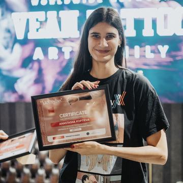 Instructor demonstrating laser settings for lightening