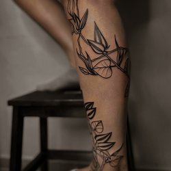 Women's leg tattoos